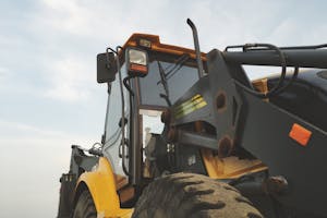 Yellow and Black Heavy Equipment Under Blue Sky