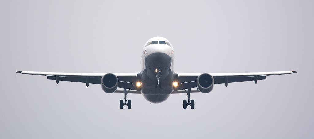 Time Lapse Photography of White Commercial Airplane